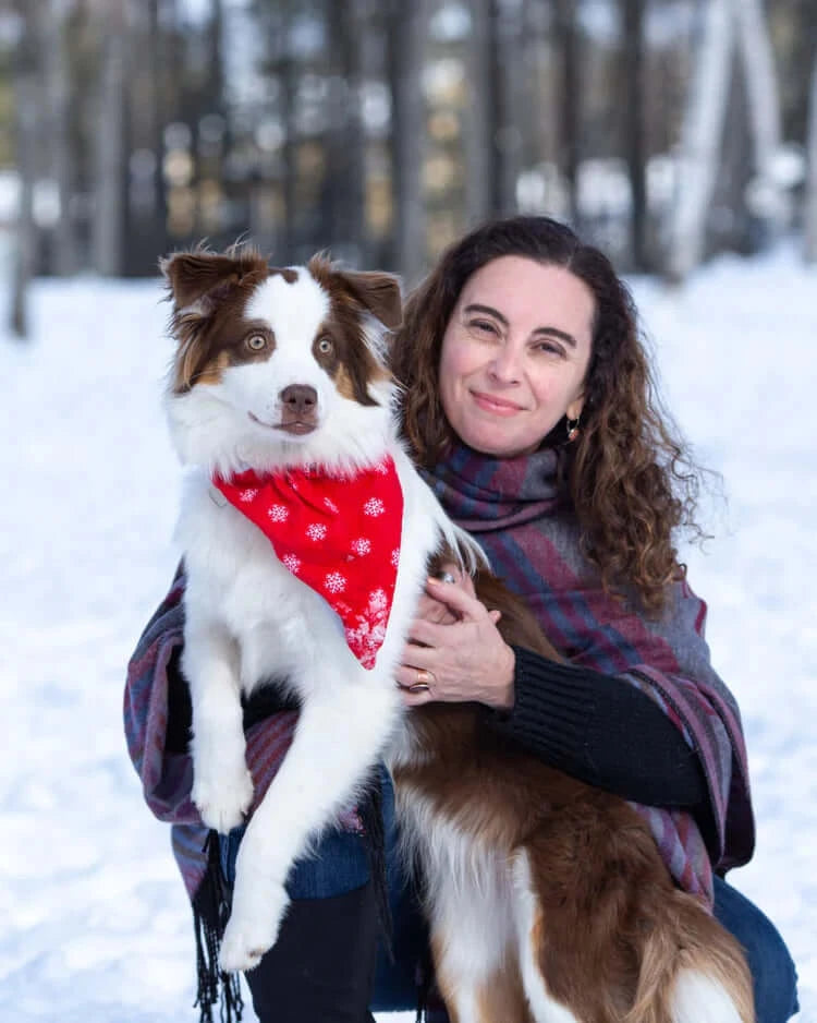 Dr. Gisela with dog outside - Owner of Nature's Pet