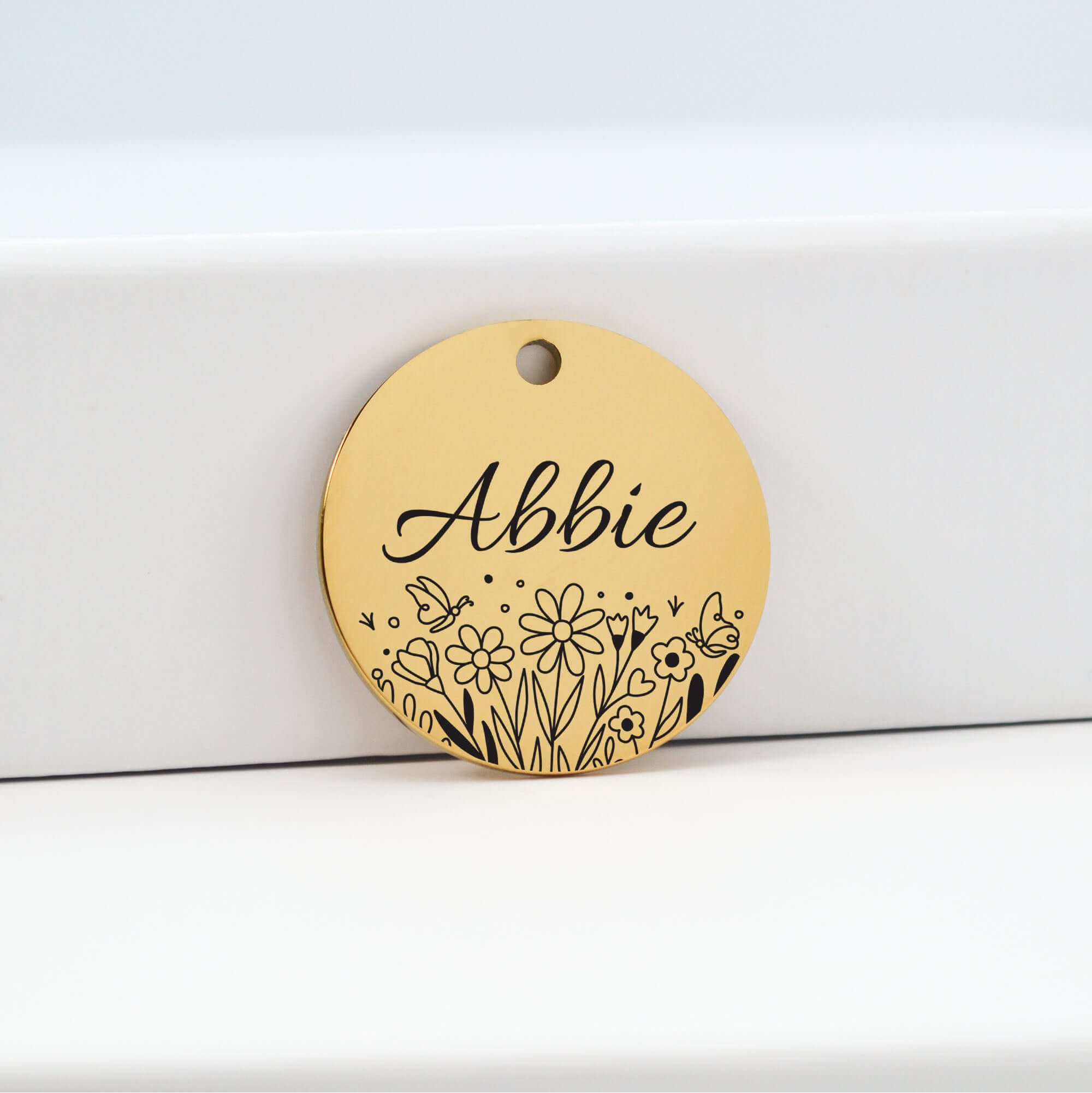 Gold dog tag