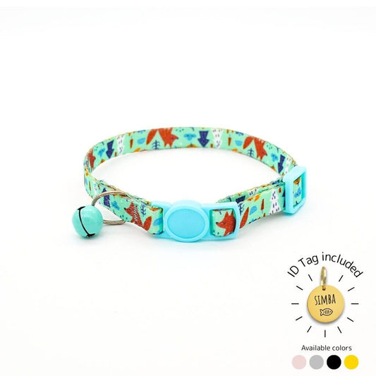 Nature-themed cat collar with fox and tree print, light blue buckle, and bell, includes personalized ID tag.