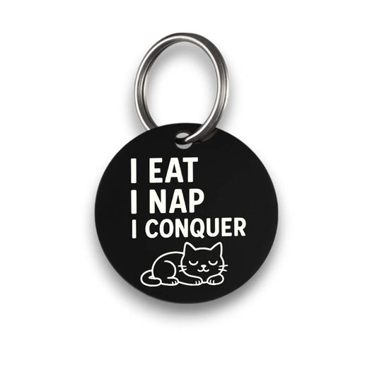 Funny black pet ID tag for dogs and cats with the engraved text 'I eat I nap I conquer' - Tag4MyPet