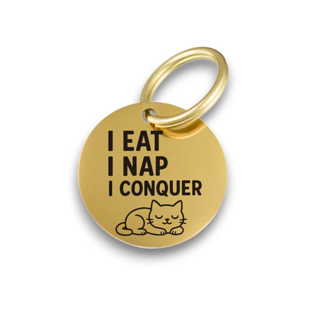 Funny gold pet ID tag for dogs and cats with the engraved text 'I eat I nap I conquer' - Tag4MyPet