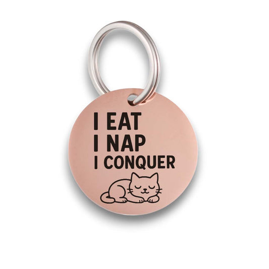 Funny rose gold pet ID tag for dogs and cats with the engraved text 'I eat I nap I conquer' - Tag4MyPet