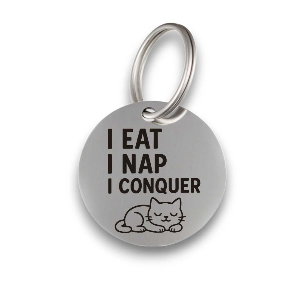 Funny silver pet ID tag for dogs and cats with the engraved text 'I eat I nap I conquer' - Tag4MyPet