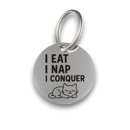 Funny silver pet ID tag for dogs and cats with the engraved text 'I eat I nap I conquer' - Tag4MyPet