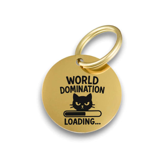 Funny gold pet ID tag for dogs and cats with the engraved text 'World Domination' - Tag4MyPet