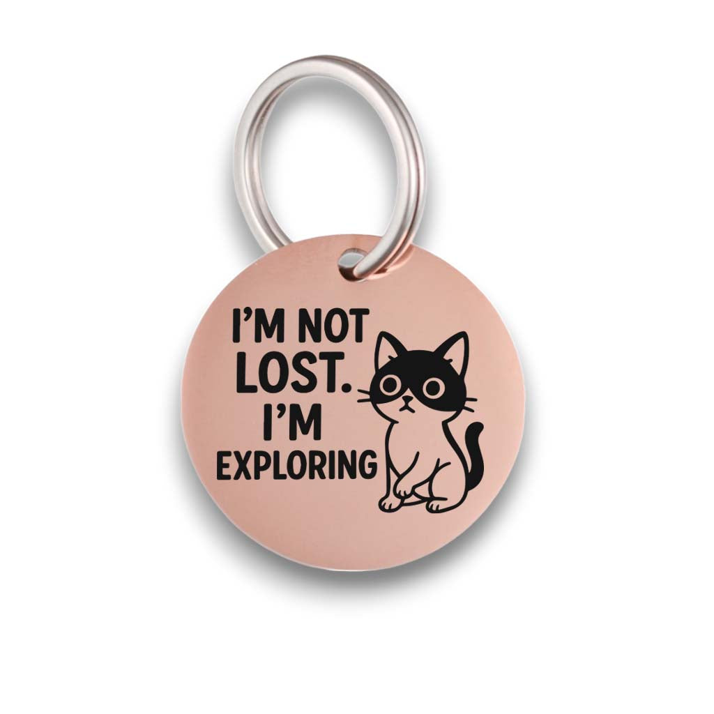 Funny rose gold pet ID tag for dogs and cats with the engraved text 'I'm Not Lost.I'm Exploring' - Tag4MyPet