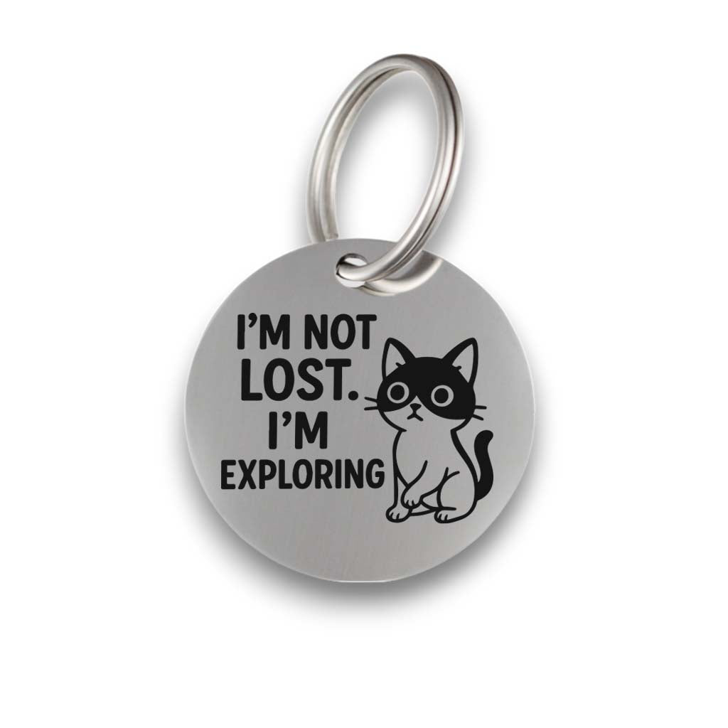 Funny silver pet ID tag for dogs and cats with the engraved text 'I'm Not Lost.I'm Exploring' - Tag4MyPet