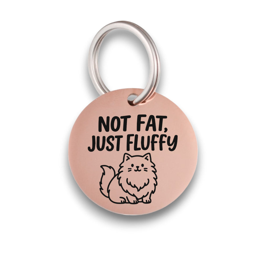 Funny rose gold pet ID tag for dogs and cats with the engraved text 'Not Fat, Just Fluffy' - Tag4MyPet