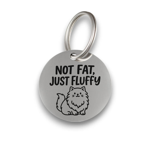 Funny silver pet ID tag for dogs and cats with the engraved text 'Not Fat, Just Fluffy' - Tag4MyPet