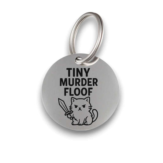 Funny silver pet ID tag for dogs and cats with the engraved text 'Tiny Murder Floof' - Tag4MyPet