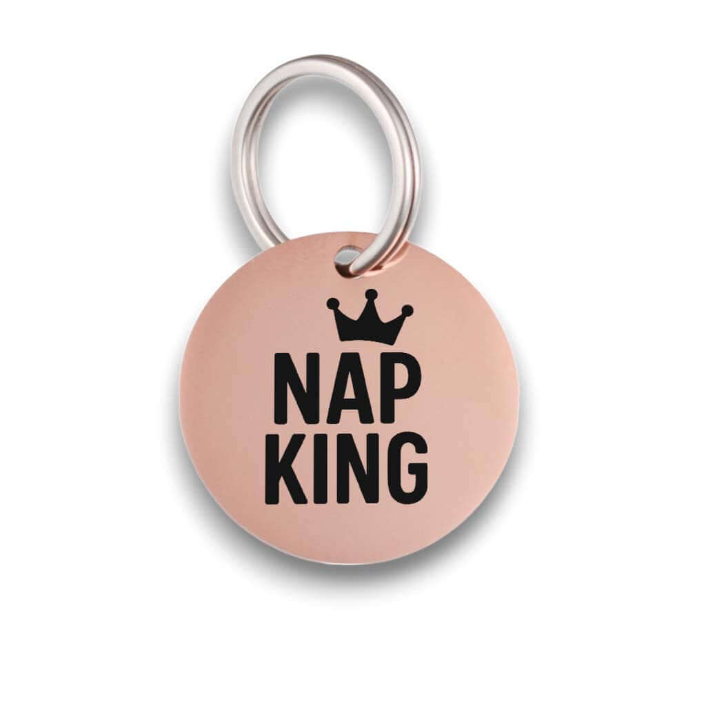 Funny rose gold pet ID tag for dogs and cats with the engraved text 'Nap King' - Tag4MyPet