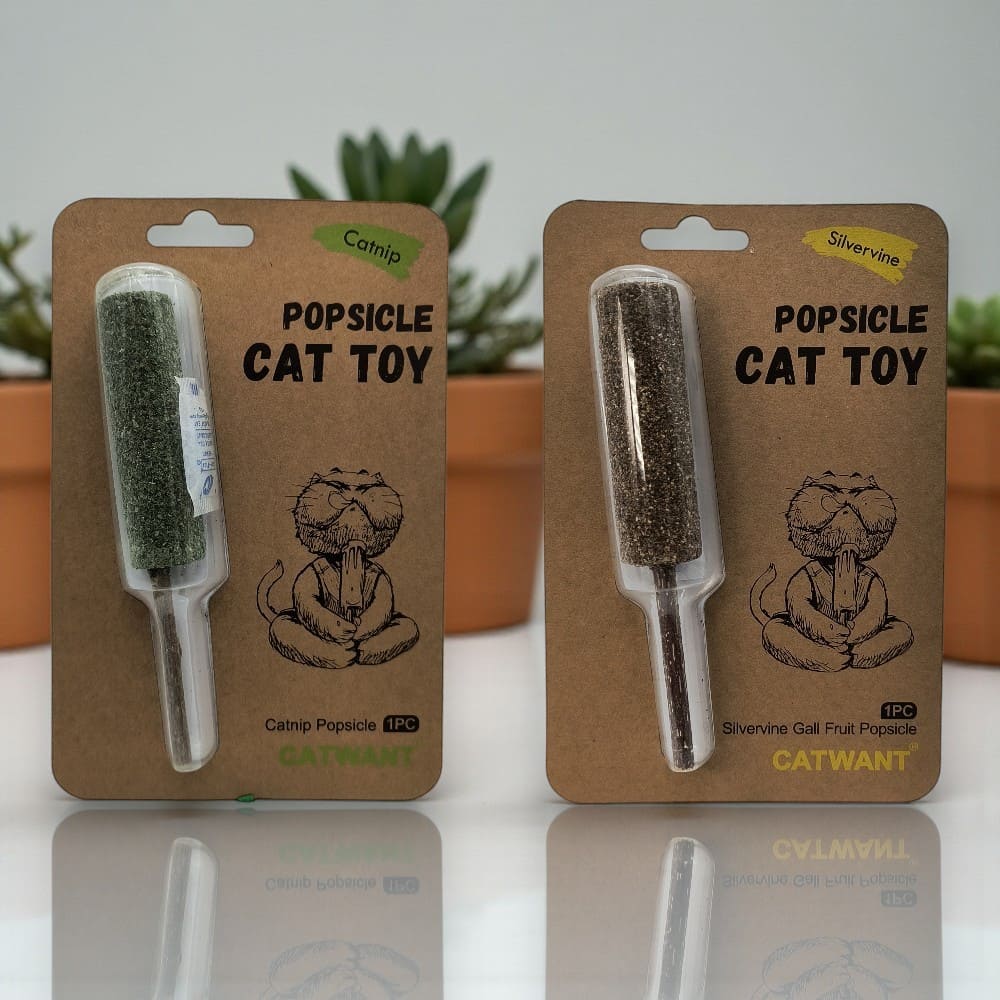 Two toy popsicles for cats, made of catnip and silvervine, in the packaging.