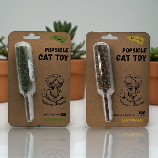 Two toy popsicles for cats, made of catnip and silvervine, in the packaging.