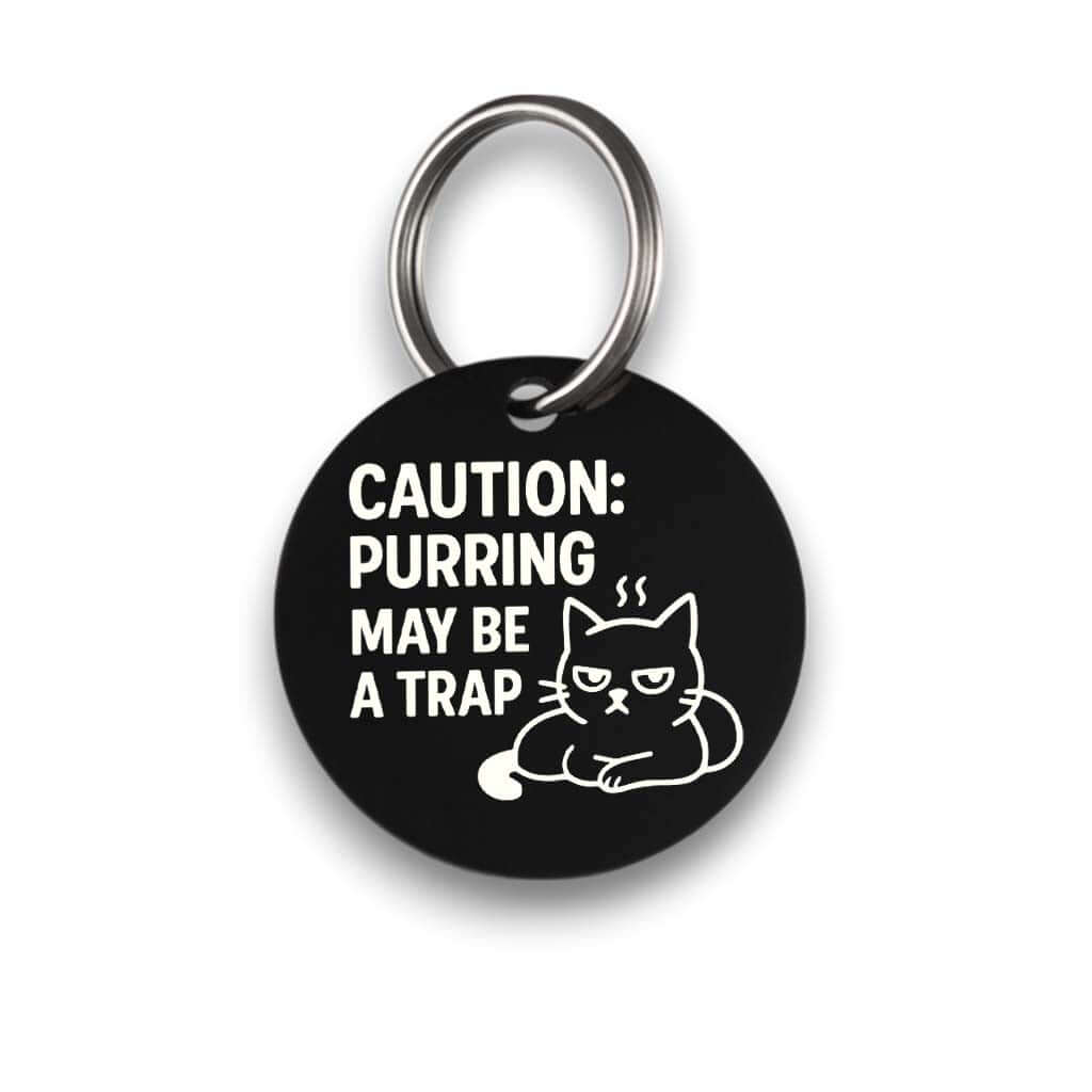 Funny black pet ID tag for dogs and cats with the engraved text 'Caution:purring may be a trap' - Tag4MyPet