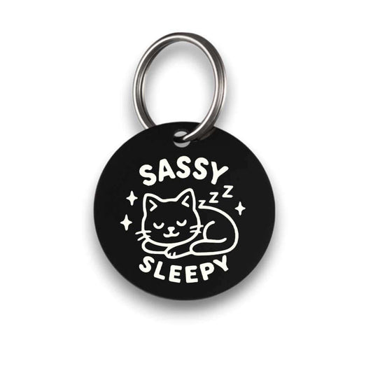 Funny black pet ID tag for dogs and cats with the engraved text 'Sassy Sleepy' - Tag4MyPet