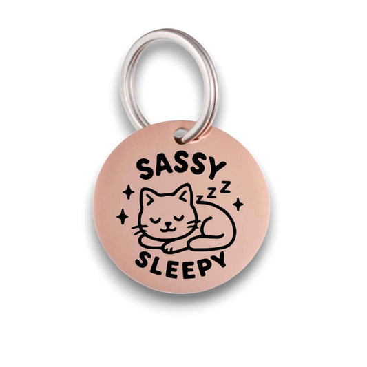 Funny rose gold pet ID tag for dogs and cats with the engraved text 'Sassy Sleepy' - Tag4MyPet
