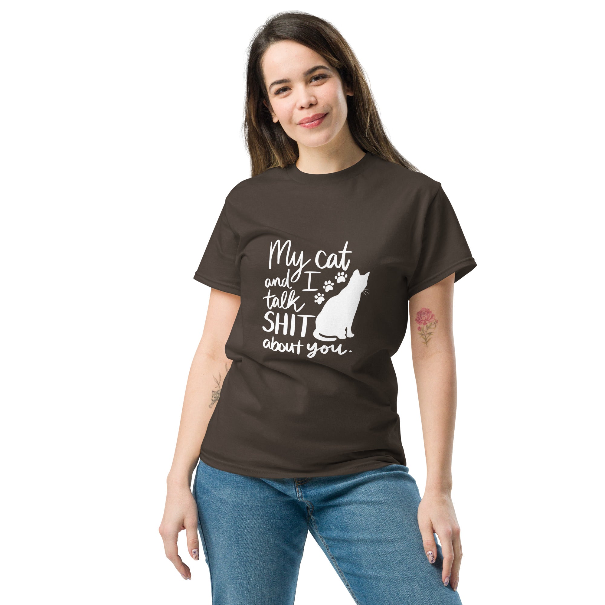 A woman wearing a brown t-shirt with text "My cat and I talk shit about you" with silhouette of cat and paw prints