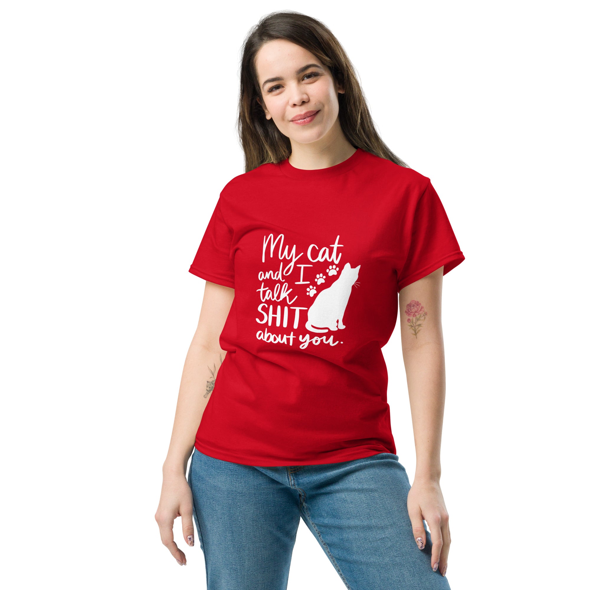 A woman wearing a red t-shirt with text "My cat and I talk shit about you" with silhouette of cat and paw prints