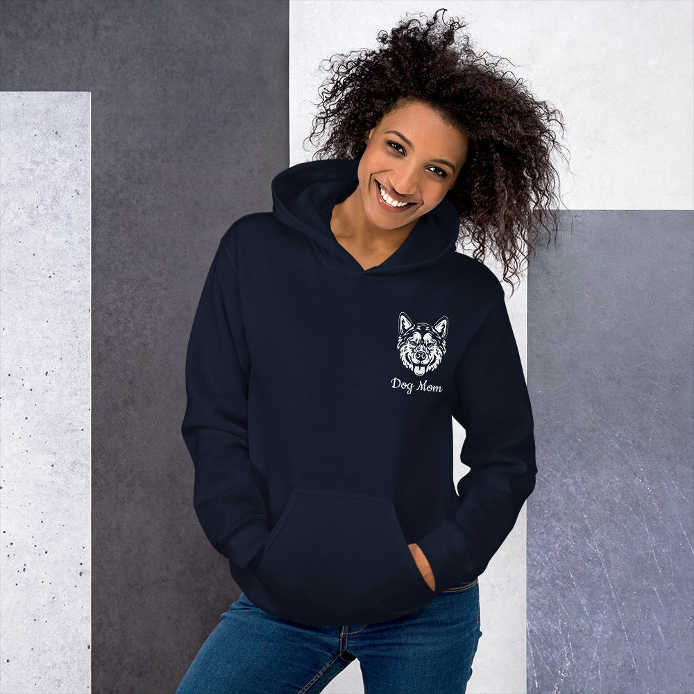 Woman Wearing hoodie with dog face pattern and text: Dog Mom